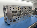 DAUA reconditioned cylinder head valve face